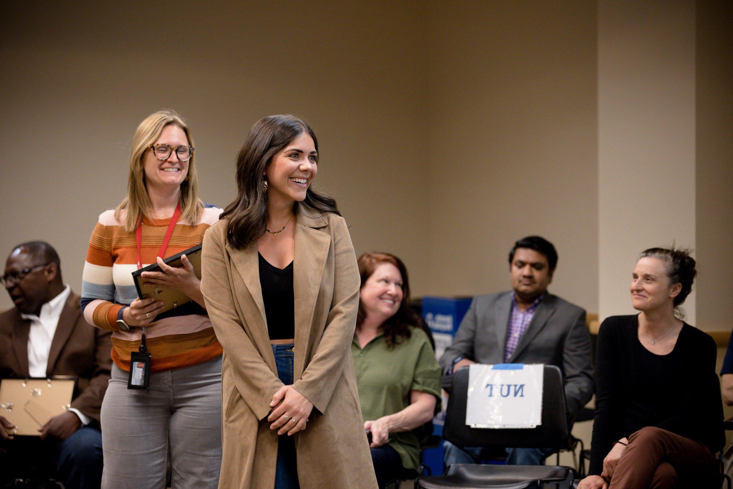 A photo of a student receiving the Dean's Award for the 2022-2023 school year.