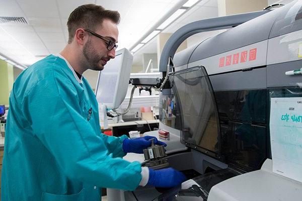 Laboratory scientist working in lab